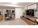 Home office with two monitors, comfortable office chair, and additional seating space at 2337 S Franklin St, Denver, CO 80210