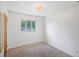 Cozy bedroom with carpet, natural light, and closet space at 892 S Union Blvd, Lakewood, CO 80228