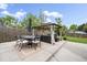 Inviting backyard oasis featuring outdoor dining and lounge area under a gazebo, perfect for entertaining at 2865 S Cherry Way, Denver, CO 80222