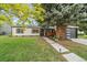 Well-kept single Gathering home with mature trees and landscaping in front yard at 2865 S Cherry Way, Denver, CO 80222