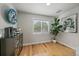 Bright kitchen features an espresso machine, natural lighting, and an accent wall decoration at 2865 S Cherry Way, Denver, CO 80222