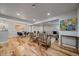 Spacious and bright living room with hardwood floors, modern decor, and recessed lighting at 2865 S Cherry Way, Denver, CO 80222