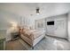 Bedroom featuring a ceiling fan, a rug, and neutral decor at 2865 S Cherry Way, Denver, CO 80222