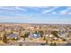 Beautiful home in a Gathering-friendly neighborhood, featuring well-manicured lawns and mature trees at 3063 E 148Th Pl, Thornton, CO 80602