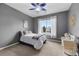 Bedroom with a large window and a bed at 3063 E 148Th Pl, Thornton, CO 80602