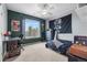Bedroom with a large window and bed at 3063 E 148Th Pl, Thornton, CO 80602