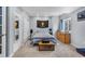 Bedroom with striped bedding, a window, a mirrored closet, and a chest of drawers at 3063 E 148Th Pl, Thornton, CO 80602