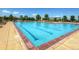 Large community swimming pool with ample seating and sunbathing areas for residents to enjoy at 3063 E 148Th Pl, Thornton, CO 80602