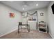 Bright bedroom features a desk, decor, and a view from the window, creating a cozy and functional space at 16120 E Radcliff Pl, Aurora, CO 80015