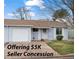 Charming single-story home with light blue siding, attached garage and well-maintained front yard at 16120 E Radcliff Pl, Aurora, CO 80015