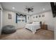 Comfortable main bedroom with carpet, ceiling fan and natural light at 16120 E Radcliff Pl, Aurora, CO 80015