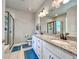 Granite countertops and modern fixtures accent this well-lit bathroom at 26554 E Indore Ave, Aurora, CO 80016