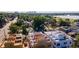 Aerial view of townhomes under construction with a distant city skyline view at 5128 W 26Th Ave # 208, Denver, CO 80212