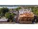 Aerial view of the townhome development under construction near a lake at 5128 W 26Th Ave # 208, Denver, CO 80212