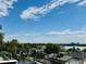 Stunning aerial view showcasing city skyline and lake views from rooftop deck at 5128 W 26Th Ave # 208, Denver, CO 80212