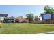 Outdoor seating area with large lawn and movie screen at 5128 W 26Th Ave # 208, Denver, CO 80212