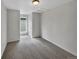 Empty bedroom features neutral carpet, white walls, and a window offering natural light at 4548 Quandary Peak St, Brighton, CO 80601