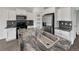 Modern kitchen with stainless steel appliances, sleek countertops, and ample cabinet space at 4548 Quandary Peak St, Brighton, CO 80601