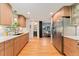 Updated kitchen featuring sleek cabinets and stainless steel appliances at 3807 S Jasmine St, Denver, CO 80237