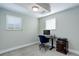 Simple office with natural light with a desk, computer and printer at 6071 S Ingalls St, Littleton, CO 80123