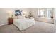 Bright bedroom with a large window and comfortable decor at 23585 Genesee Village Rd # E, Golden, CO 80401