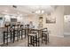 Stylish kitchen with granite countertops, modern appliances, and ample seating at the island, ideal for casual dining at 23585 Genesee Village Rd # E, Golden, CO 80401