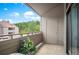 Private patio offering views of the surrounding community, as well as additional storage space at 23585 Genesee Village Rd # E, Golden, CO 80401