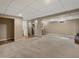 Finished basement featuring neutral carpeting and a convenient wet bar area at 4484 S Granby Ct, Aurora, CO 80015