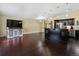 Open-concept living space featuring a modern kitchen and plenty of natural light at 4484 S Granby Ct, Aurora, CO 80015
