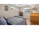 Cozy bedroom with natural light, stylish decor, and a comfortable bed at 9700 W 88Th Pl, Westminster, CO 80021