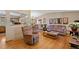 Inviting living room features hardwood floors, comfortable seating, and abundant natural light at 9700 W 88Th Pl, Westminster, CO 80021