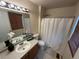 Bathroom with a shower and vanity at 2033 Espana Way, Aurora, CO 80011
