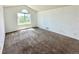 Bedroom with a large window that provides natural light at 2033 Espana Way, Aurora, CO 80011
