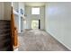 Bright living room with tall ceilings and a large window letting in natural light at 2033 Espana Way, Aurora, CO 80011
