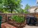 Fenced backyard featuring trees, a garden, a patio, and a grill at 3086 W 107Th Pl # F, Westminster, CO 80031