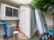 Home exterior featuring a storage shed, A/C unit, bicycle, and other outdoor equipment at 3086 W 107Th Pl # F, Westminster, CO 80031