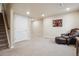 Finished basement area featuring neutral decor, carpeted flooring, and recessed lighting at 3102 Fox Sedge Pl, Highlands Ranch, CO 80126