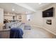 Finished basement with comfortable seating and entertainment area for Gathering and guests at 3102 Fox Sedge Pl, Highlands Ranch, CO 80126