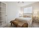Cozy bedroom with neutral tones, carpet, and a comfortable queen-sized bed at 3102 Fox Sedge Pl, Highlands Ranch, CO 80126