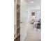 Bedroom view showing open closet and modern decor at 5555 Julian St, Denver, CO 80221