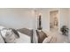 Comfortable bedroom features a walk-in closet and an ensuite bathroom for convenience at 5555 Julian St, Denver, CO 80221