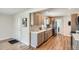 Bright kitchen with modern appliances, light wood cabinetry, and plenty of counter space at 5555 Julian St, Denver, CO 80221