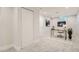 A home office with modern desk, chair, carpet and decor for a clean and productive work-from-home environment at 5555 Julian St, Denver, CO 80221