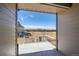 Covered patio with scenic views of the landscape, ideal for relaxing and enjoying the outdoors at 11926 Barrentine Loop, Parker, CO 80138