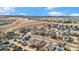 Stunning aerial view of the community with many unique homes and beautiful landscape at 4318 Fossil Way, Castle Rock, CO 80109