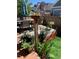 Beautifully landscaped backyard with potted plants, table, and sitting area, perfect for outdoor enjoyment at 4318 Fossil Way, Castle Rock, CO 80109
