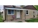 Inviting front porch featuring a charming entrance and decorative awning, perfect for relaxing outdoors at 2880 W 91St Pl, Denver, CO 80260