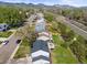 A neighborhood aerial shot of the property, demonstrating the proximity to local roads and community at 10895 W Bowles Pl, Littleton, CO 80127