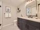 Stylish bathroom featuring a modern vanity, neutral walls, and decorative accents at 1350 E Amherst Ave, Englewood, CO 80113