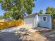 Detached garage with ample parking space and a well-maintained exterior at 1350 E Amherst Ave, Englewood, CO 80113